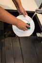 Woman washing dishes in the kitchen sink Royalty Free Stock Photo