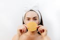 Woman washing face with sponge or pad Royalty Free Stock Photo