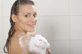 Woman washing her body shower gel Royalty Free Stock Photo