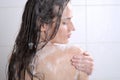 Woman washing her body shower gel Royalty Free Stock Photo