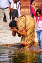 Woman washing in a pool in the courtyard of Jama Masjid in Fatehpur Sikri, Uttar Pradesh, India