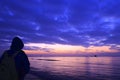 Woman watch seaside sunrise Royalty Free Stock Photo