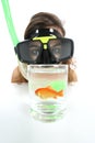 Woman watching a fish with goggles with holiday desire of diving