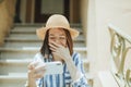 Woman watching an online movie on her phone