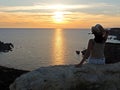 woman watching the sunset from the mountain Royalty Free Stock Photo