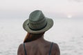 Woman watching sunset on the sea horizon Royalty Free Stock Photo