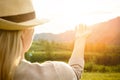 Woman watching the sunset. Serenity and relaxation. Royalty Free Stock Photo