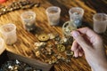 Woman watchmaker works with gears