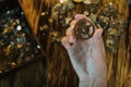 Woman watchmaker works with gears