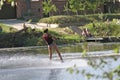 Woman on a water ski. Royalty Free Stock Photo