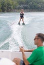 woman water skiing behind boat Royalty Free Stock Photo
