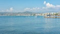 Woman water skiing in the Golfe Juan with in the background the hotels of the French city of Juan-les-Pins