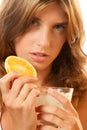 Woman with water and slice of orange Royalty Free Stock Photo