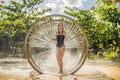 Woman in Water tunnel in the water amusement park