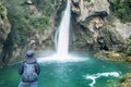 Woman at the waterfall