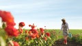 Woman with watering can walking near rose bushes. Gardening tool Royalty Free Stock Photo