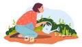 A woman with a watering can. A woman in the garden is watering plants. Organic gardening.