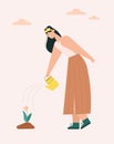 Woman watering flowers, farmer works on farm