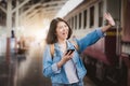 Woman waving hand goodbye to farewell Royalty Free Stock Photo