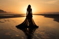 Woman Wear Black Long Dress Walking On A White Sand Beach At Sunset Royalty Free Stock Photo