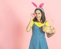 Woman wear bunny ear and hold easter egg cover eye Royalty Free Stock Photo