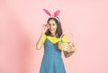 Woman wear bunny ear and hold easter egg cover eye Royalty Free Stock Photo