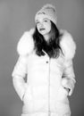 Woman wear down jacket. Style code with elegance. For those wishing stay modern. Winter clothes. Warm and cozy. Girl