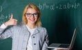 Woman wear eyeglasses holds laptop surfing internet. Great resource for teachers. Online schooling concept. Educator