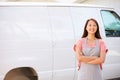 Woman Wearing Apron Standing In Front Of Van Royalty Free Stock Photo