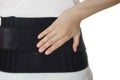 Woman wearing back support belt Royalty Free Stock Photo