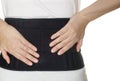 Woman wearing back support belt Royalty Free Stock Photo