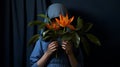 Girl In Blue Holding Flower A Dark And Captivating Photo Composition Royalty Free Stock Photo