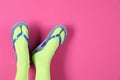 Woman wearing bright socks with flip-flops Royalty Free Stock Photo