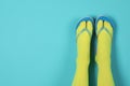 Woman wearing bright socks with flip-flops and space for design Royalty Free Stock Photo