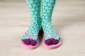 Woman wearing bright socks with flip-flops Royalty Free Stock Photo