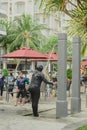 Woman wearing burqini swimming suit is taking shower before entering the pool