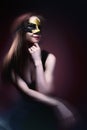 Woman wearing carnival venetian mask on blur background. Royalty Free Stock Photo