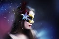 Woman wearing carnival venetian mask on blur background. Royalty Free Stock Photo