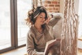 Woman wearing cashmere nightwear relaxing in cabin Royalty Free Stock Photo