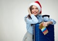 Woman wearing Christmas Santa hat holding credit payment card, p Royalty Free Stock Photo