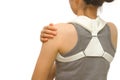 Woman wearing clavicle brace for immobilize shoulder