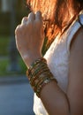 Woman wearing colorful bangles and waiting for her love