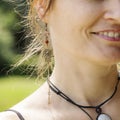 Woman wearing decorative earrings