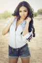 Woman wearing denim shirt and shorts Royalty Free Stock Photo