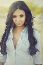 Woman wearing denim shirt and shorts Royalty Free Stock Photo