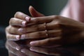 a woman wearing a diamond ring on her hand Royalty Free Stock Photo