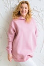 Woman wearing empty pink hoodie and posing against a white wall Royalty Free Stock Photo