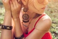 Woman wearing exotic jewellery and golden mehendi tattoo