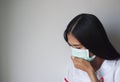 Woman wearing face medical mask, woman coughing, sick, illness