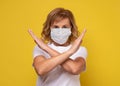 Woman wearing face protection in prevention for coronavirus showing gesture Stop Infection